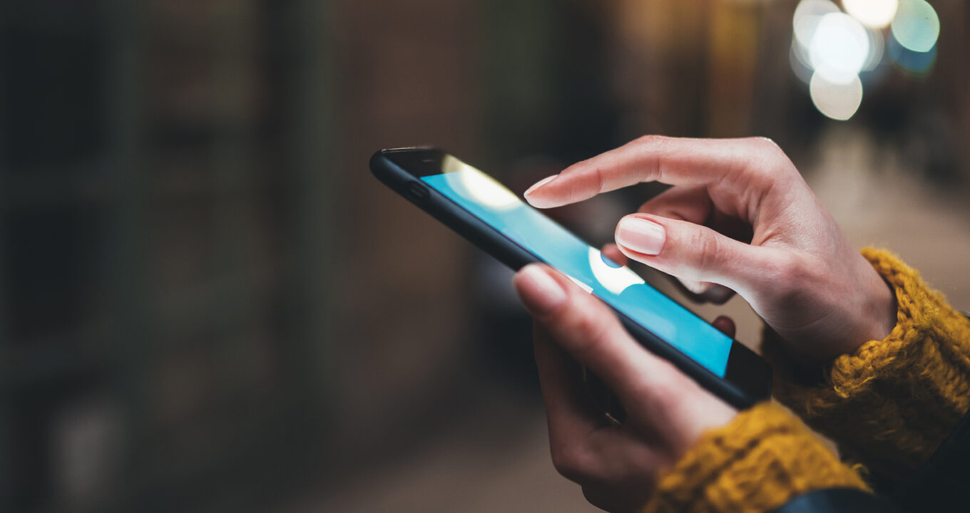 Lady holding a mobile phone