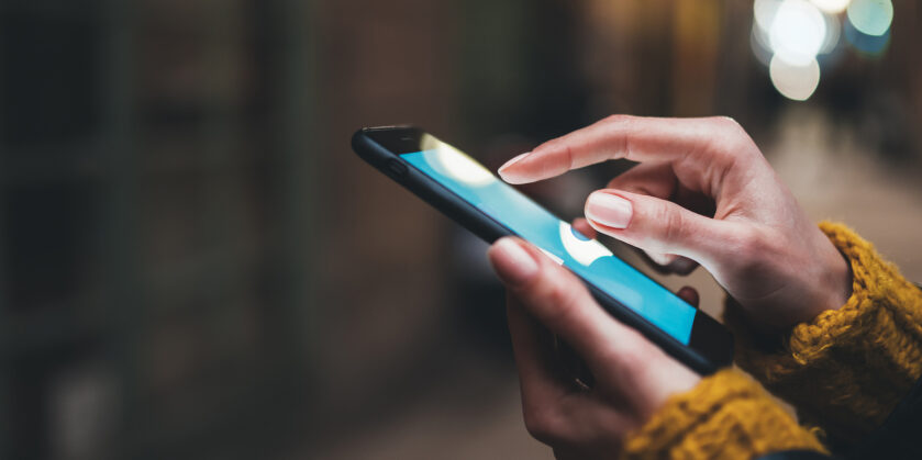 Lady holding a mobile phone