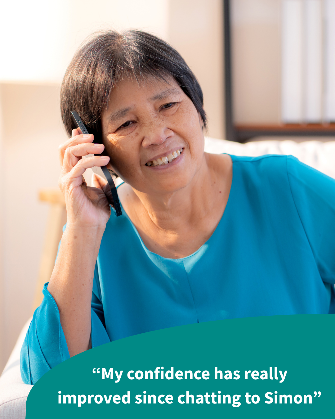 Image of a lady smiling whilst using the telephone. Text overlay reads "My confidence has really improved since chatting to Simon".